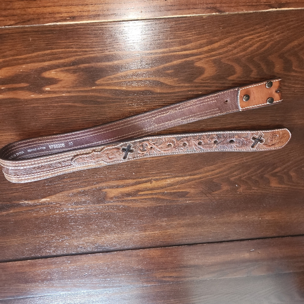 Cavender’s brand black/ brown leather belt. Size 30 JUST BELT NO BUCKLE